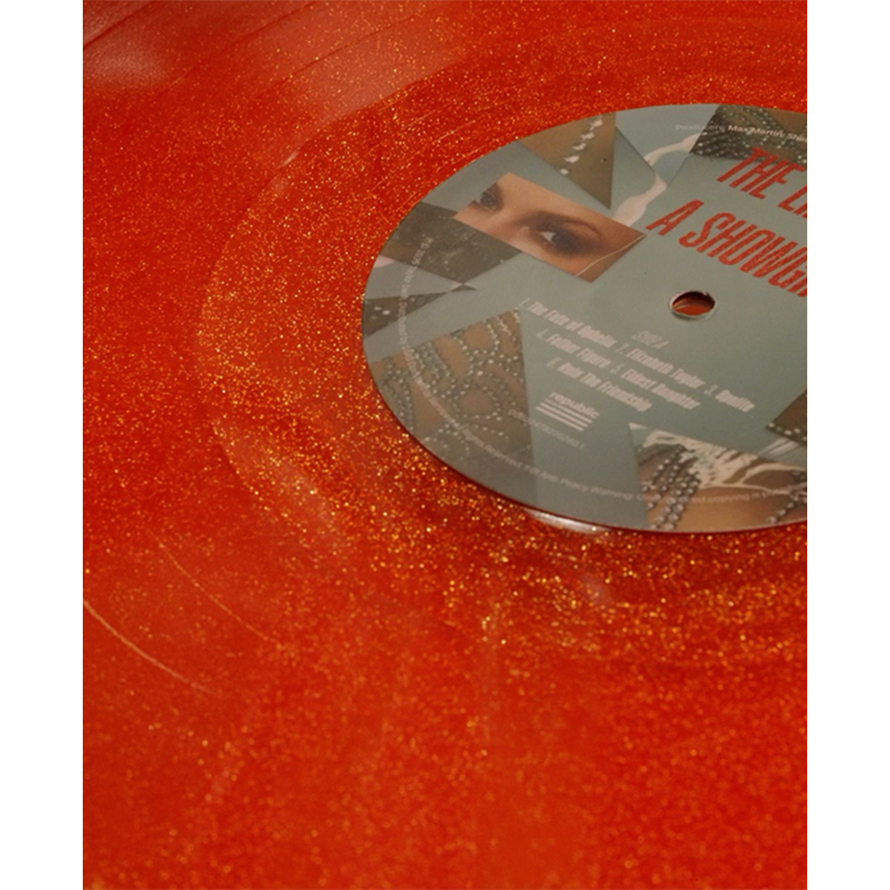 The Life of a Showgirl: Sweat and Vanilla Perfume Portofino Orange Glitter Vinyl Detail
